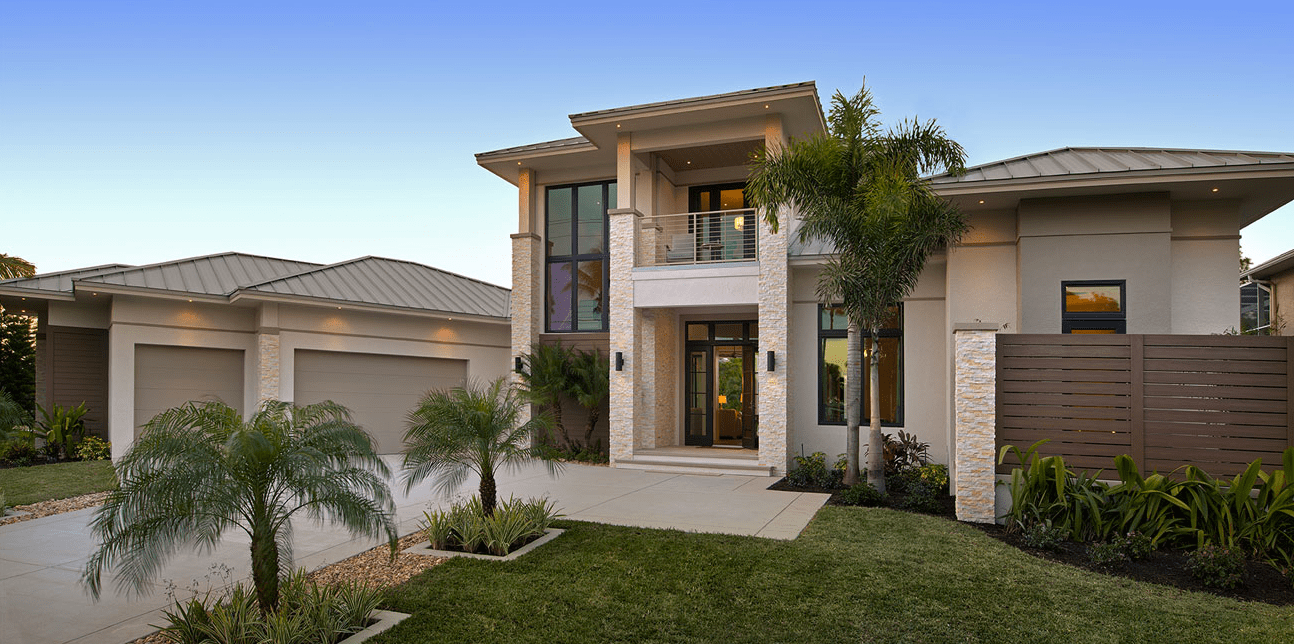 Norstone Ivory Stacked Stone Rock Panels on Entryway of Residential Suburban Home in Florida